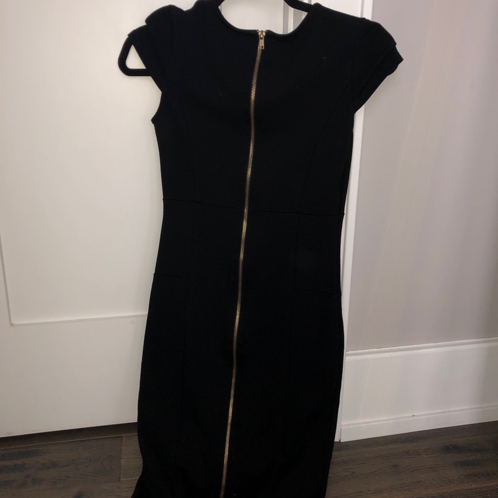 Black dress with gold zipper down the back